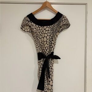 Elegant Black and Cream Patterned Dress